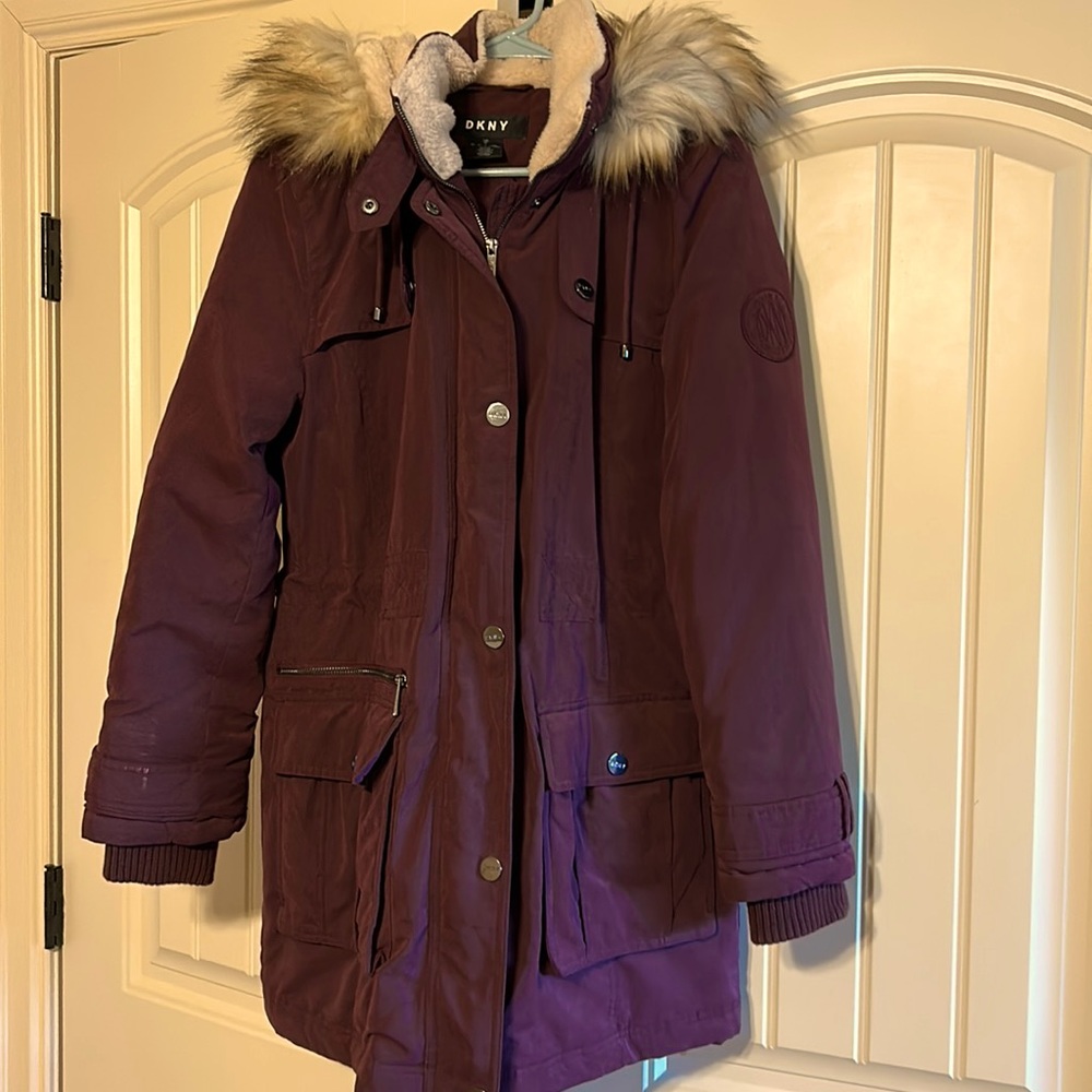 Winter coat DKNY. Maroon w/removable hood, lots of pockets. Size medium